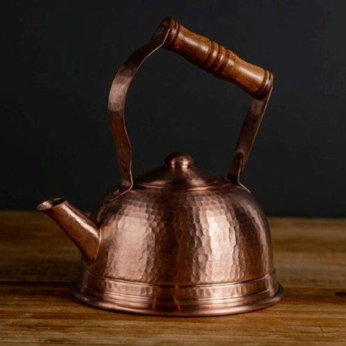 https://www.thenopo.com/cdn/shop/products/the-nopo-mexico-artesano-casa-copper-tea-pot-with-wooden-handle-02_500x500.jpg?v=1645015700