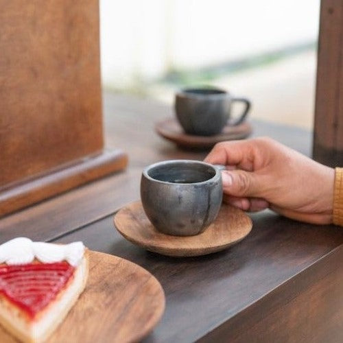 https://www.thenopo.com/cdn/shop/products/the-nopo-mexico-hacer-comun-clay-semi-matte-cups-and-mahogany-saucers-set-of-4-10_500x500.jpg?v=1655151865