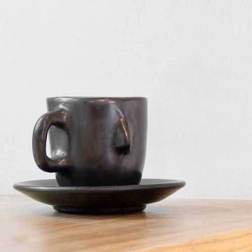 https://www.thenopo.com/cdn/shop/products/the-nopo-mexico-m-a-estudio-set-of-two-black-senorcito-espresso-mugs-01_500x500.jpg?v=1645186432