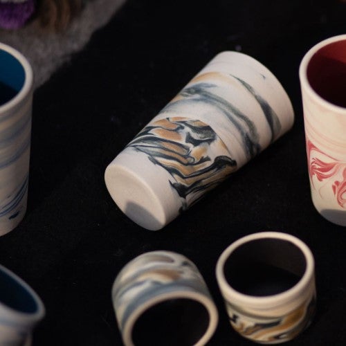 https://www.thenopo.com/cdn/shop/products/the-nopo-mexico-natalia-and-brian-handmade-mexican-marbled-drinking-cups-set-of-4-04_500x500.jpg?v=1658938575