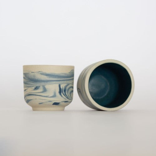 https://www.thenopo.com/cdn/shop/products/the-nopo-mexico-natalia-and-brian-handmade-mexican-marbled-espresso-cups-set-of-4-01_500x500.jpg?v=1645021210