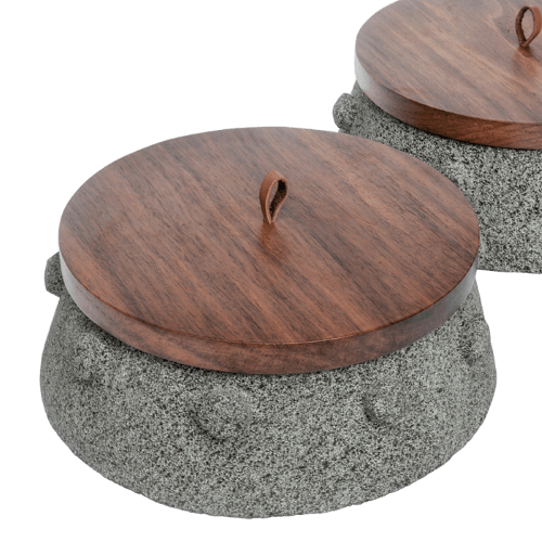 https://www.thenopo.com/cdn/shop/products/the-nopo-mexico-nativa-living-tepetl-stone-and-wood-tortilla-warmer-03_grande.png?v=1646386006