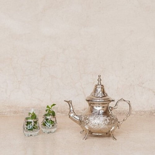 https://www.thenopo.com/cdn/shop/products/the-nopo-morocco-salah-eddine-zahouan-moroccan-silver-tea-pot-04_500x500.jpg?v=1645585252
